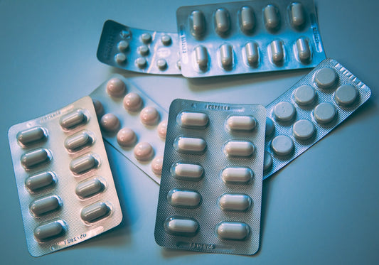 Unbranded blister packs of white supplement capsules